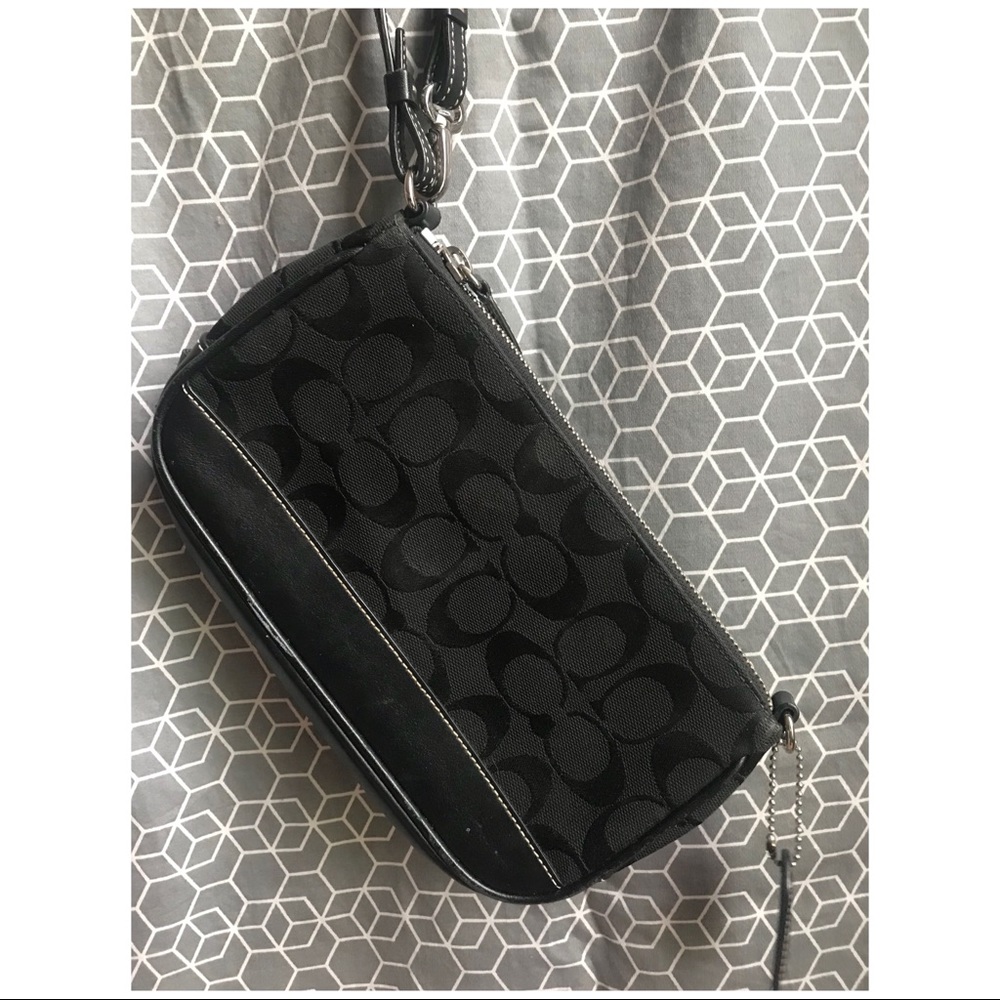 Small Coach purse / oversized wristlet.